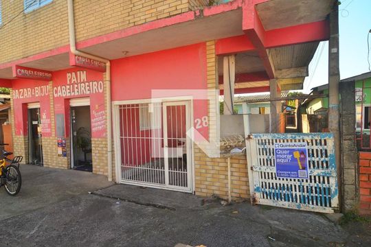 Fachada de casa à venda com 3 quartos, 120m² em Harmonia, Canoas