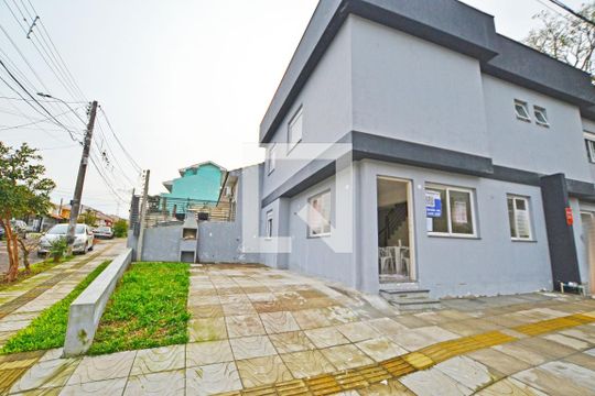Fachada/Garagem de casa à venda com 3 quartos, 101m² em Guarujá, Porto Alegre