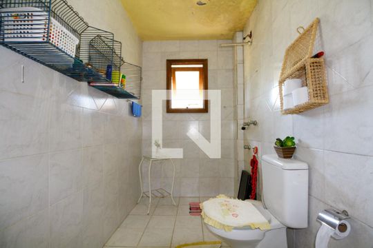Banheiro Quarto 1 de casa à venda com 4 quartos, 460m² em Aberta dos Morros, Porto Alegre