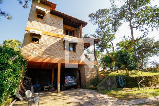 Fachada de casa para alugar com 4 quartos, 460m² em Aberta dos Morros, Porto Alegre
