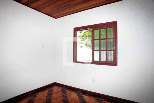 Quarto 2 de casa à venda com 3 quartos, 100m² em Rio Branco, Porto Alegre