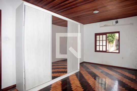 Quarto 1 de casa à venda com 3 quartos, 100m² em Rio Branco, Porto Alegre