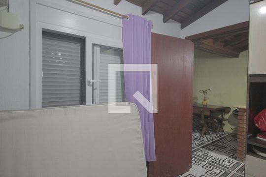 Quarto 1 de casa de condomínio à venda com 4 quartos, 88m² em Bairro Fátima, Canoas