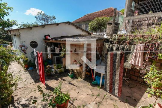Quintal de casa à venda com 3 quartos, 160m² em Tristeza, Porto Alegre
