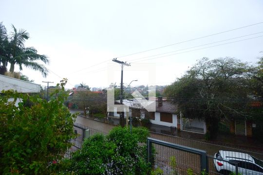 Vista da Sala de casa à venda com 3 quartos, 227m² em Três Figueiras, Porto Alegre