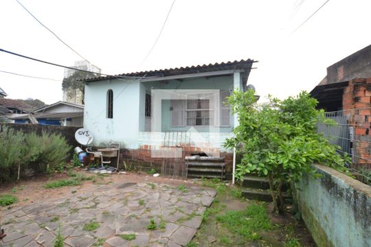 Fachada da Casa 1 de casa à venda com 3 quartos, 430m² em Santo Antônio, Porto Alegre