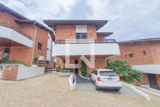 Fachada de casa de condomínio para alugar com 5 quartos, 320m² em Jardim Tres Marias, Guarujá