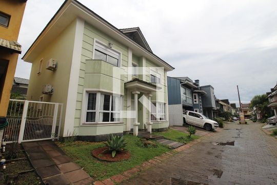 Fachada da casa de casa de condomínio à venda com 3 quartos, 230m² em Sarandi, Porto Alegre