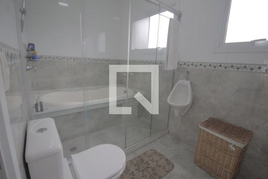 Banheiro da Suíte de casa de condomínio à venda com 3 quartos, 230m² em Sarandi, Porto Alegre
