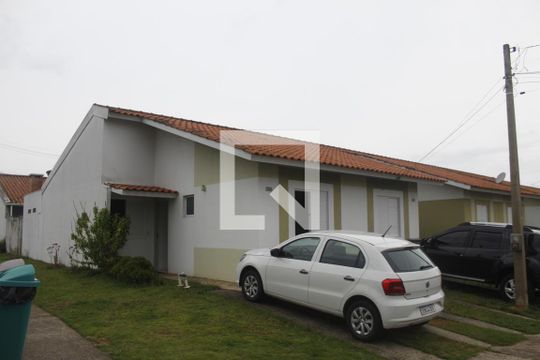Fachada de casa de condomínio para alugar com 2 quartos, 51m² em Terra Nova, Viamão