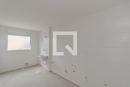 Cozinha e Área de Serviço de apartamento à venda com 2 quartos, 83m² em São João, Porto Alegre