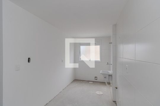 Cozinha e Área de Serviço de apartamento à venda com 2 quartos, 83m² em São João, Porto Alegre