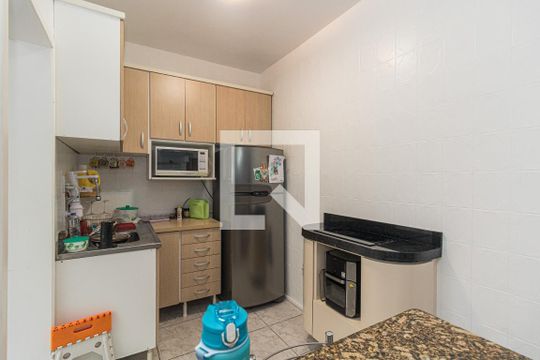 Cozinha e Área de Serviço de apartamento à venda com 2 quartos, 70m² em São João, Porto Alegre