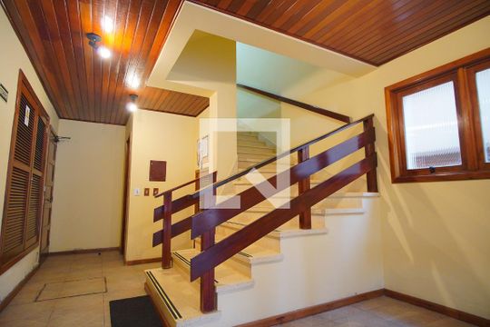 Hall de entrada de apartamento à venda com 1 quarto, 70m² em Jardim Itu, Porto Alegre