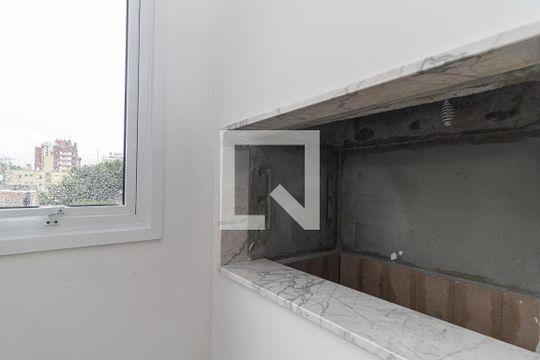 Cozinha e Área de Serviço de apartamento à venda com 3 quartos, 112m² em Auxiliadora, Porto Alegre