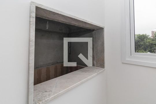 Cozinha e Área de Serviço de apartamento à venda com 3 quartos, 112m² em Auxiliadora, Porto Alegre