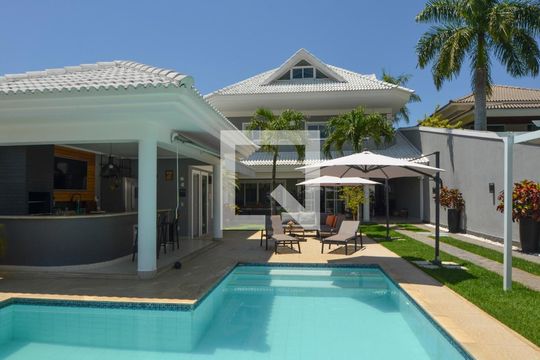 Fachada de casa de condomínio à venda com 6 quartos, 431m² em Barra da Tijuca, Rio de Janeiro