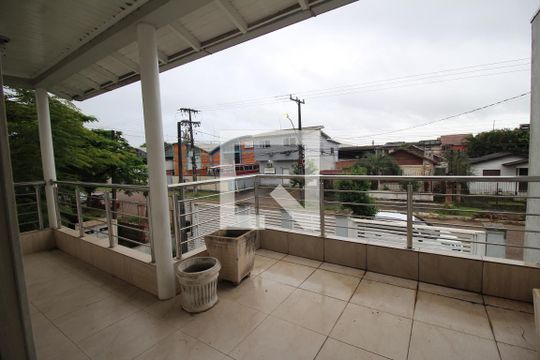 Varanda 1 de casa à venda com 4 quartos, 198m² em Niterói, Canoas