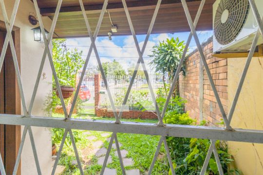 Quarto 1-Vista de casa à venda com 3 quartos, 130m² em Mato Grande, Canoas
