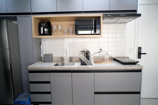 Cozinha de apartamento à venda com 1 quarto, 31m² em Jardim Paulista, São Paulo