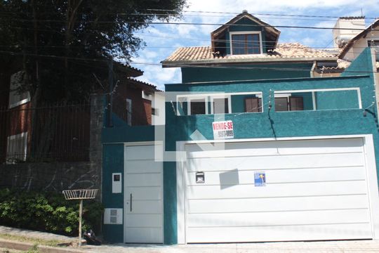Fachada de casa à venda com 3 quartos, 130m² em Jardim Londrina, São Paulo