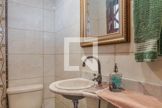 Lavabo 1 de casa de condomínio à venda com 3 quartos, 170m² em Sarandi, Porto Alegre