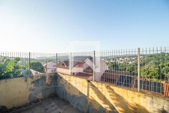 Varanda de casa à venda com 4 quartos, 300m² em Espírito Santo, Porto Alegre