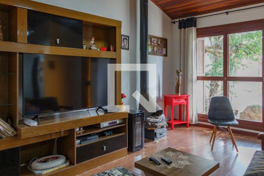 Sala de casa à venda com 3 quartos, 160m² em Vila Nova, Porto Alegre