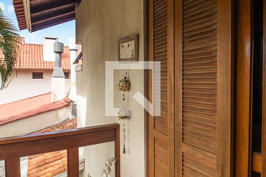 Varanda de casa de condomínio à venda com 3 quartos, 397m² em Vila Nova, Porto Alegre