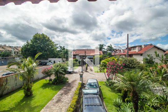 Vista de casa de condomínio à venda com 3 quartos, 397m² em Vila Nova, Porto Alegre