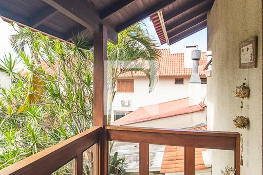 Varanda de casa de condomínio à venda com 3 quartos, 397m² em Vila Nova, Porto Alegre