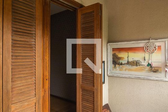 Varanda de casa de condomínio à venda com 3 quartos, 397m² em Vila Nova, Porto Alegre
