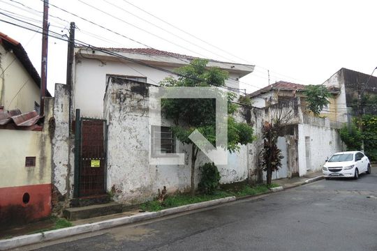 Fachada de casa à venda com 6 quartos, 382m² em Vila Portuguesa, São Paulo