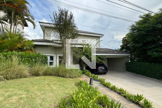 Fachada de casa de condomínio à venda com 4 quartos, 597m² em Alphaville, Santana de Parnaíba