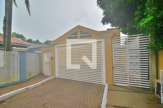 Fachada de casa de condomínio à venda com 3 quartos, 124m² em Harmonia, Canoas