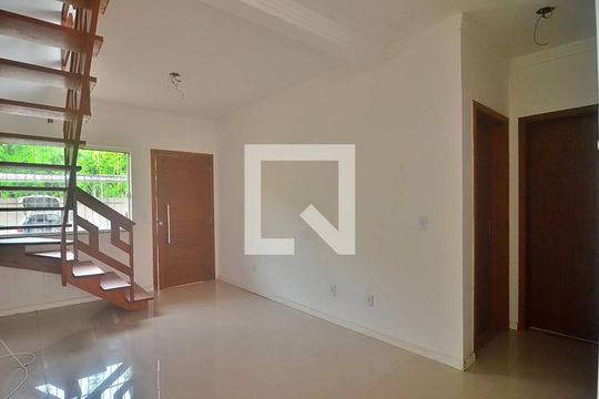 Sala de casa de condomínio à venda com 3 quartos, 124m² em Harmonia, Canoas
