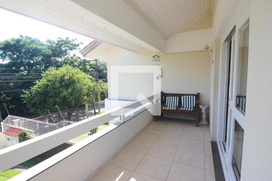 Sacada da Sala de casa à venda com 3 quartos, 201m² em Espírito Santo, Porto Alegre