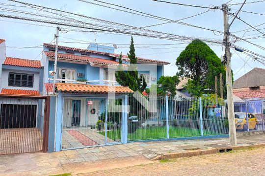 Fachada de casa à venda com 4 quartos, 310m² em Jardim Itu, Porto Alegre