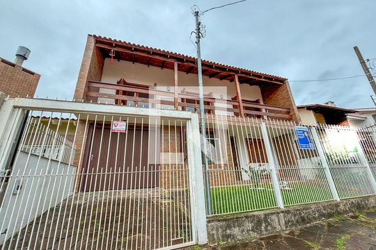 Fachada de casa à venda com 4 quartos, 388m² em Jardim Itu, Porto Alegre