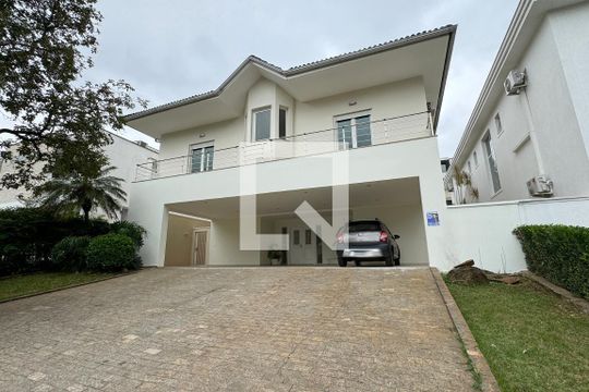 Fachada de casa de condomínio à venda com 4 quartos, 400m² em Alphaville Residencial Um, Barueri