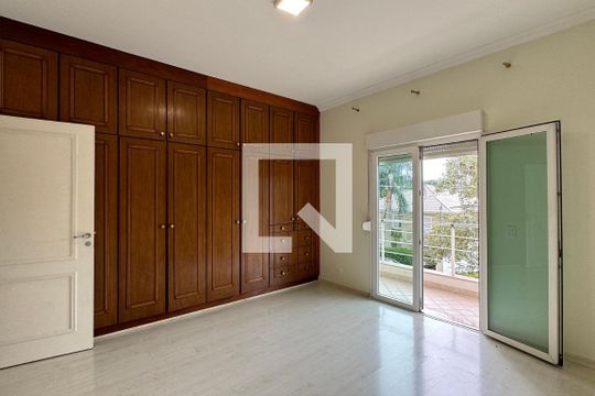 Suíte 1 de casa de condomínio à venda com 4 quartos, 400m² em Alphaville Residencial Um, Barueri