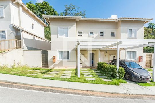 Fachada de casa de condomínio à venda com 3 quartos, 126m² em Vila Madeira, Nova Lima