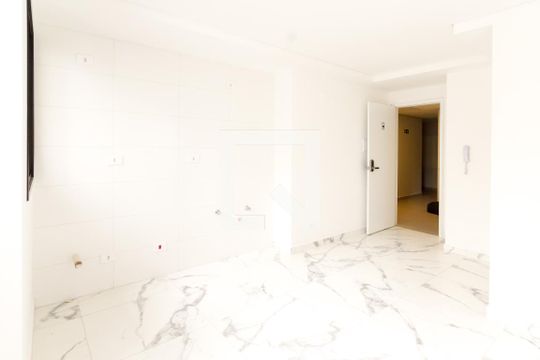 Sala, cozinha e área de serviço de apartamento para alugar com 2 quartos, 34m² em Centro, Curitiba