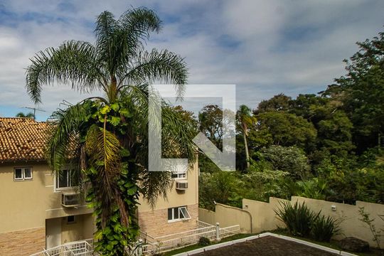 Vista de casa de condomínio à venda com 4 quartos, 243m² em Pedra Redonda, Porto Alegre