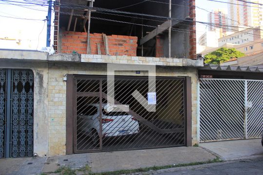 Fachada com placa QuintoAndar de casa à venda com 3 quartos, 145m² em Jardim Terezopolis, Guarulhos