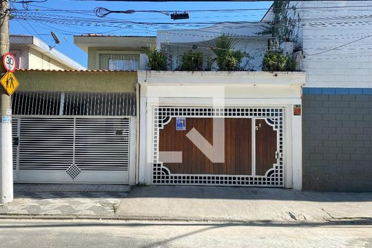 Fachada com plaquinha de casa à venda com 3 quartos, 300m² em Parque Novo Mundo, São Paulo