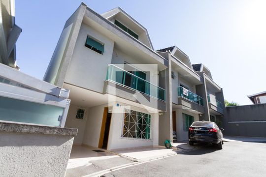 Fachada de casa de condomínio para alugar com 3 quartos, 164m² em Jardim das Américas, Curitiba