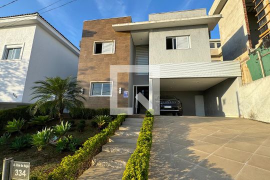 Fachada de casa de condomínio à venda com 3 quartos, 260m² em Alphaville, Santana de Parnaíba