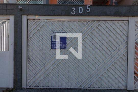 Fachada com a Plaquinha Instalada  de casa para alugar com 3 quartos, 146m² em Jardim Textil, São Paulo