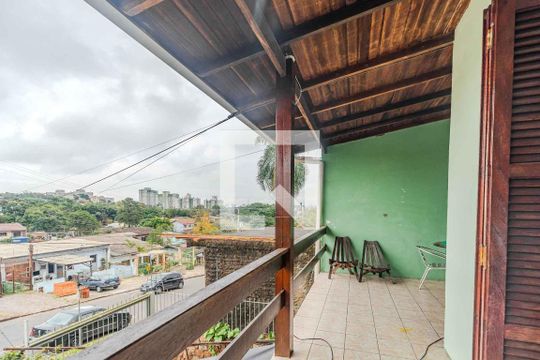 Varanda de casa à venda com 7 quartos, 278m² em Cavalhada, Porto Alegre